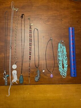 9 Necklaces various sizes and designs